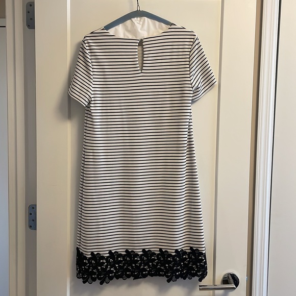 Black and white striped short sleeved dress with black lace on the bottom - Picture 2 of 6